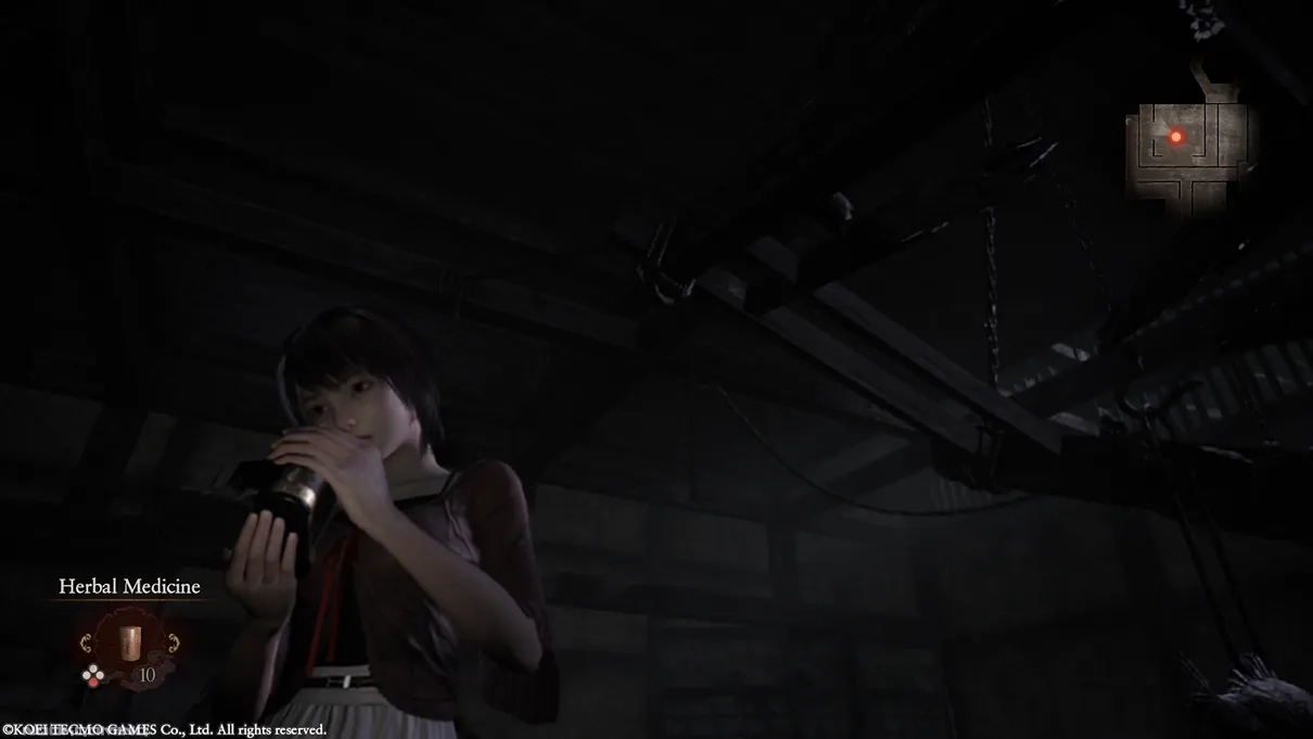 Inspecting the camera in FATAL FRAME II: Crimson Butterfly REMAKE