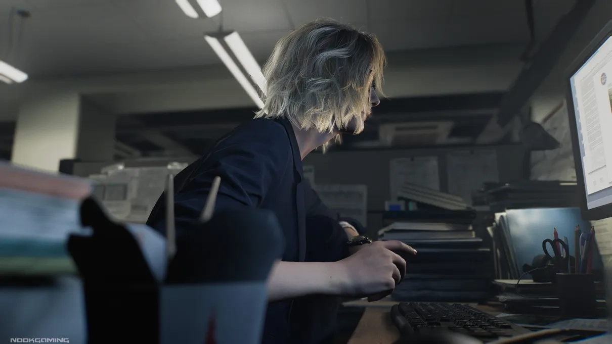 Grace using the computer in Resident Evil Requiem