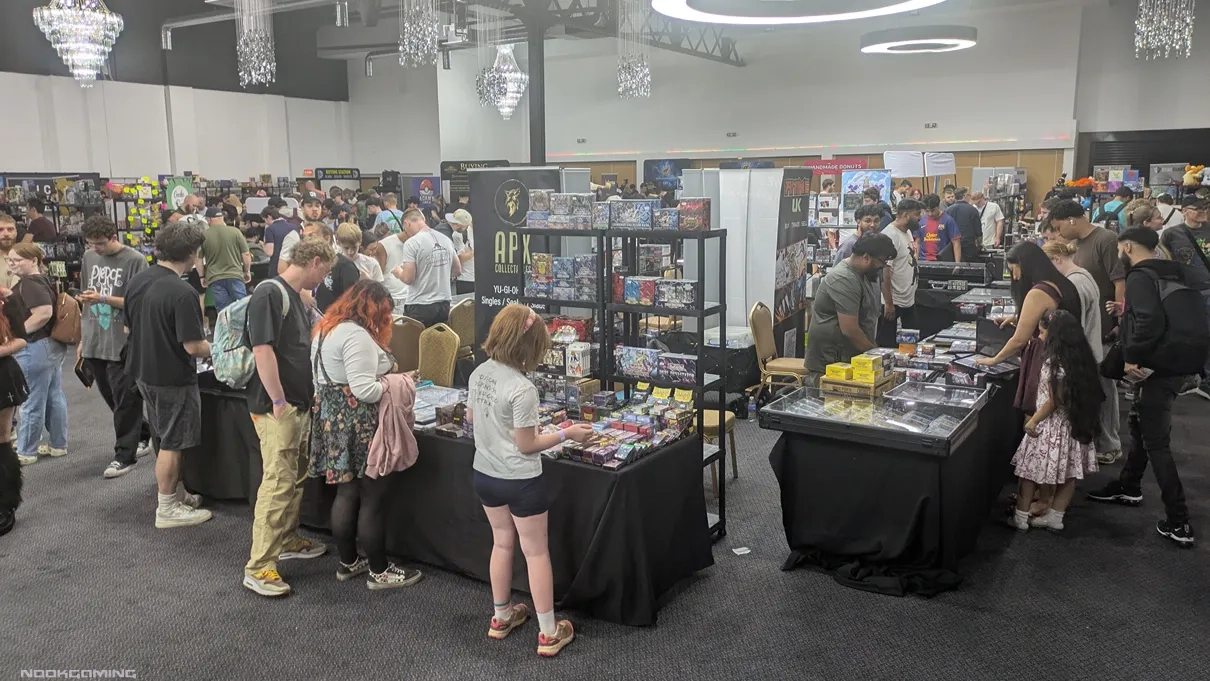 Circle of commerce at booths happening at Birmingham Card Show