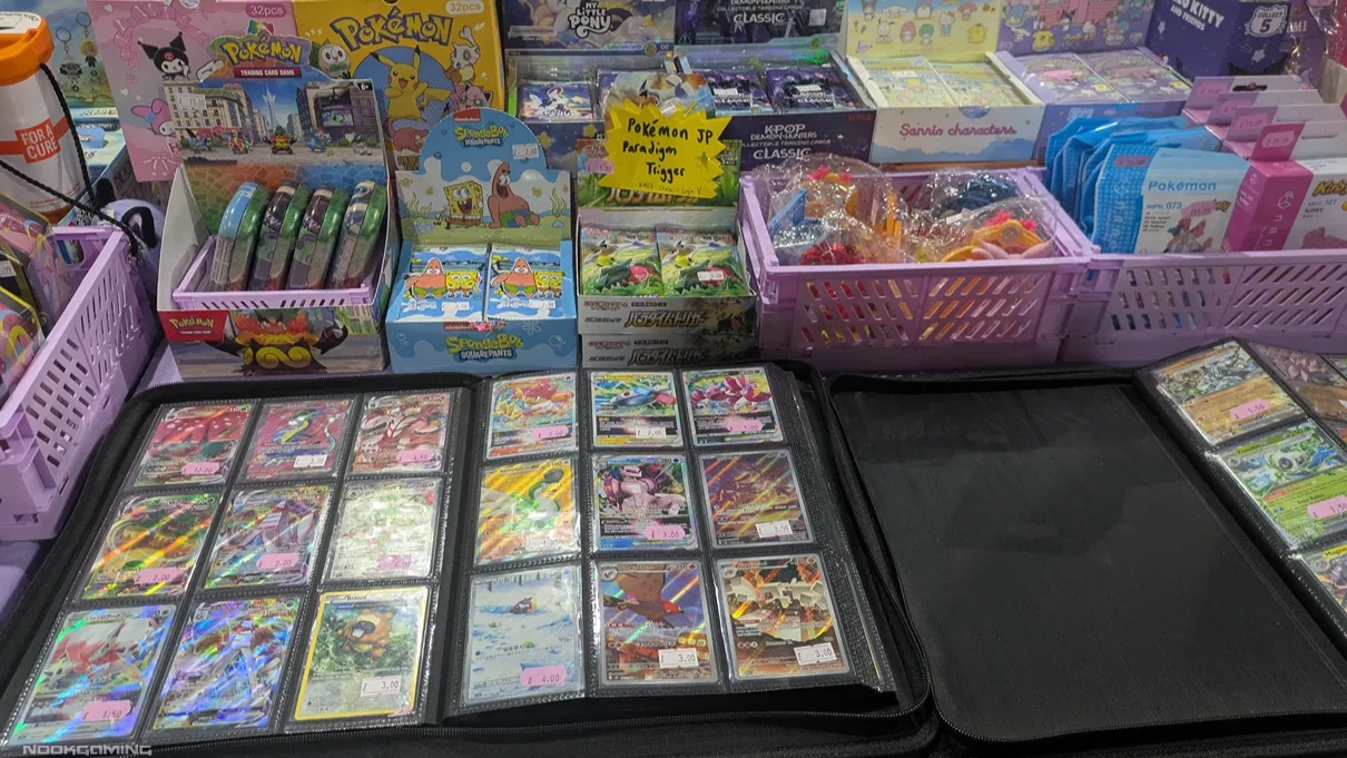 Individual cards sold in binders, plus individual packs for sale