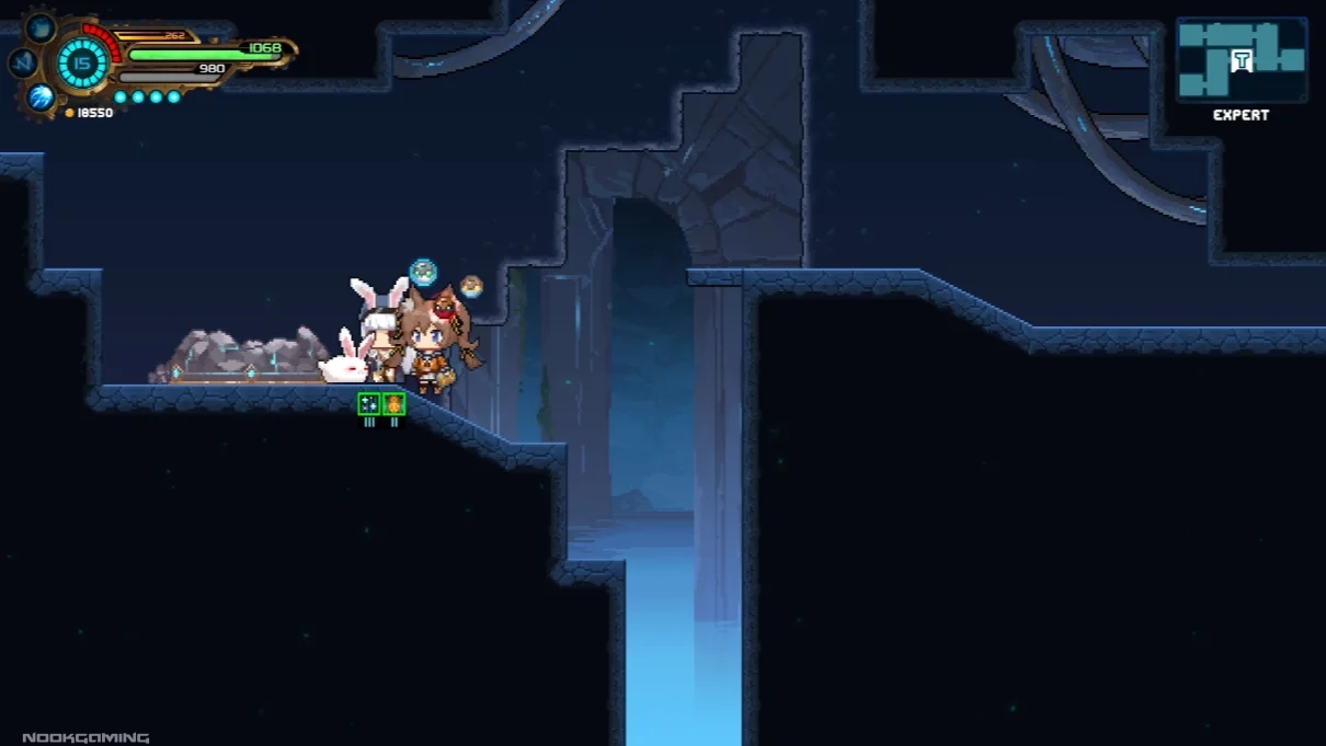 Tevi and Vena petting a rabbit in a cave area